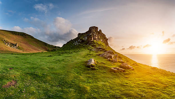 Beautiful evening sunset landscape image of Valley of The Rocks stock photo