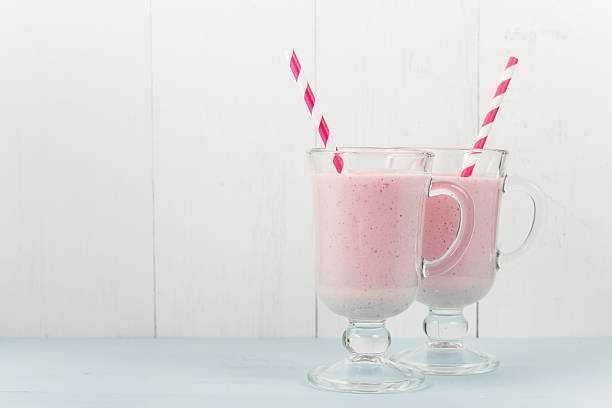 istock Two ice-cream pink cocktails with strawberries 540759610
