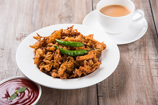 istock onion bhaji or pakora served with tomato ketchup and tea 540759762