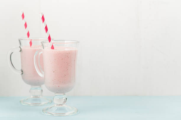 istock Two ice-cream pink cocktails with strawberries 540759852
