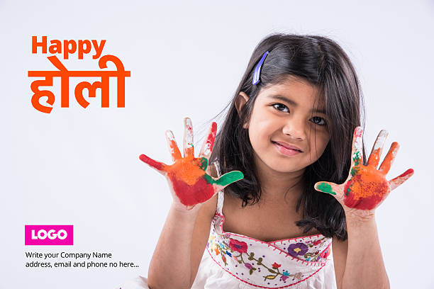 istock happy holi greeting card using indian girl with colourful palm 540760686