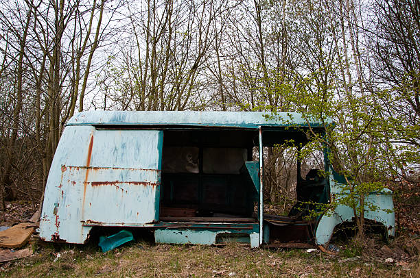 istock Old destroyed car at the edge of the forest 540761808