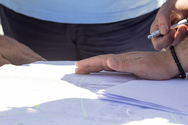 istock close up of a hand on an land map 540762396
