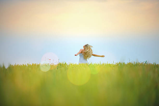istock Girl in field 540762520