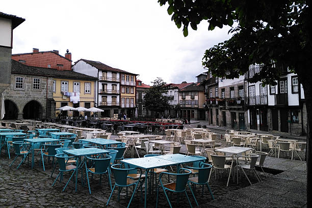 istock Empty tables and chairs in Portuguese square 540762754