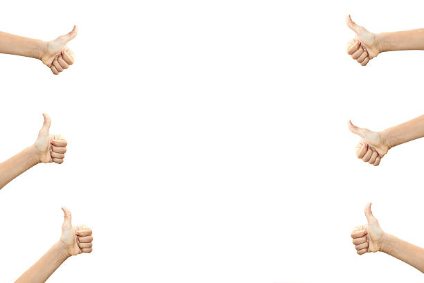 Unrecognizable people gesturing thumbs up sign over white background. There six (6) people doing thumbs up sign over isolated on white. There is a copy space for your text between hands doing ok sign.  Horizontal composition. Studio shot.