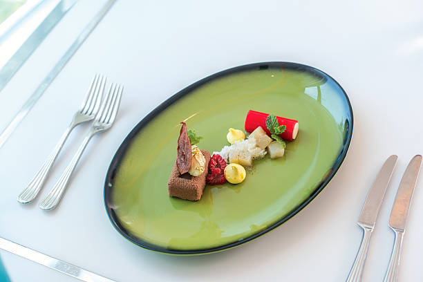 istock Smoked chocolate mousse, poached pear, chantily-raspberry log. D 540825044