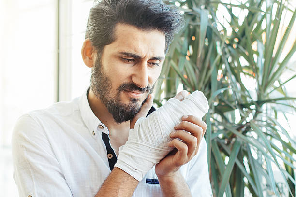 istock Bandaged hand portrait 540825118