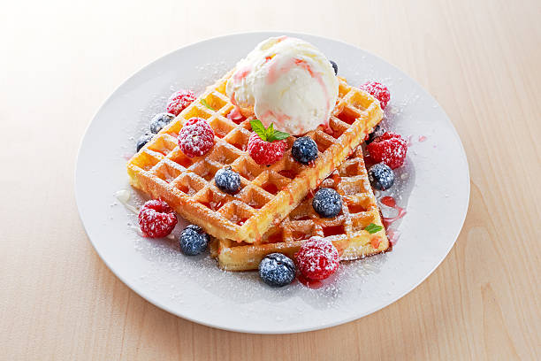 istock Belgian waffles with ice cream and fresh berries. 540825300