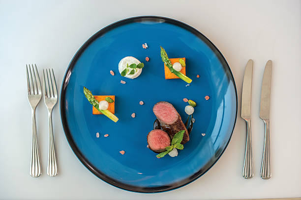 istock Roasted lamb noisette Dijon. Marinated lamb loin with salt and 540825352