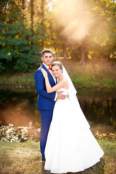 istock Funny couple on e-session. Preparing for wedding potography. 540825682