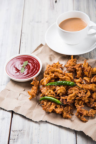 istock onion bhaji or pakora served with tomato ketchup and tea 540826116
