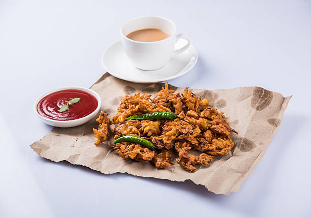 istock onion bhaji or pakora served with tomato ketchup and tea 540826344