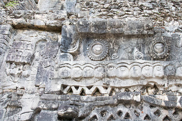 istock Mayan stele face with fist at Caracol 540826528
