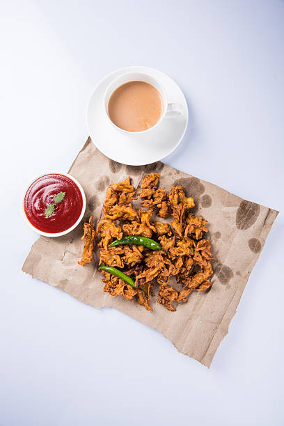 istock onion bhaji or pakora served with tomato ketchup and tea 540827060