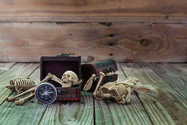 istock Ghost in the treasure chest with compass on old wood 540827864