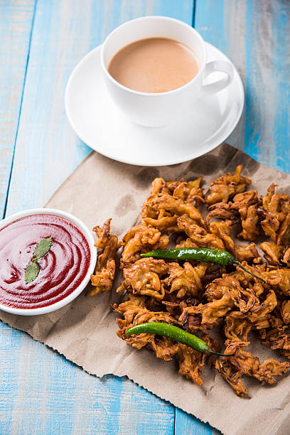 istock onion bhaji or pakora served with tomato ketchup and tea 540829086