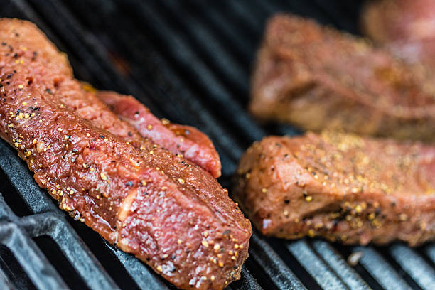 istock Raw sirloin steaks on the bbq 540829130