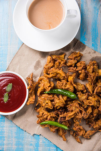 istock onion bhaji or pakora served with tomato ketchup and tea 540829854