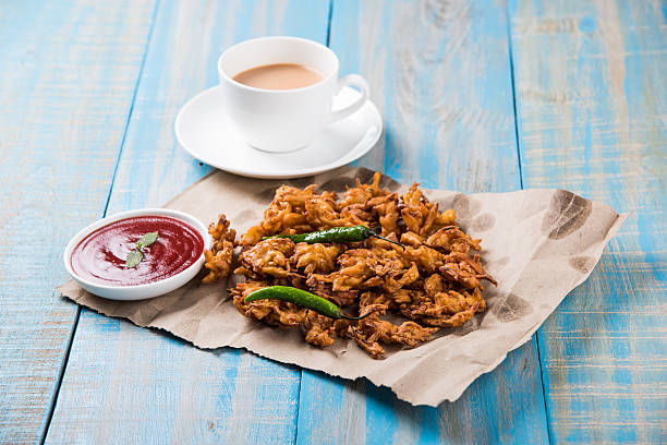 istock onion bhaji or pakora served with tomato ketchup and tea 540830166
