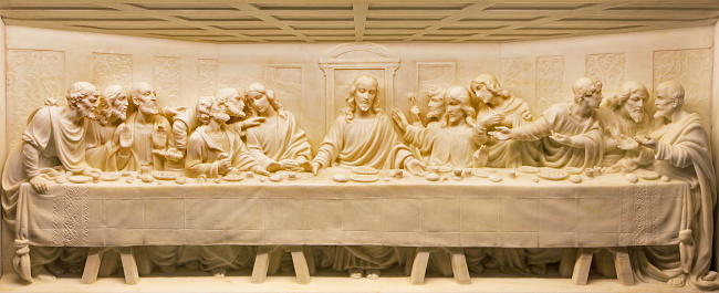 Rome, Italy - March 10, 2016: Rome - The Last Supper marble relief on the altar of church Basilica di Santa Maria Ausiliatrice by unknown artist of 19. cent.