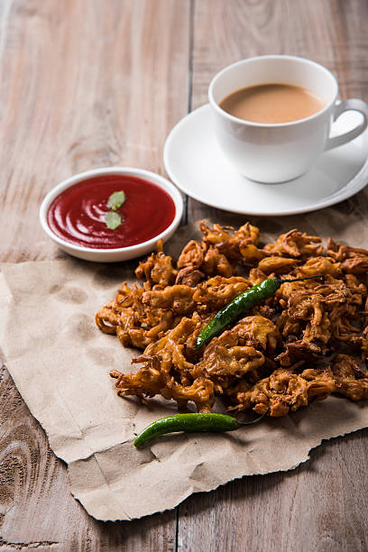 onion bhaji or pakora served with tomato ketchup and tea