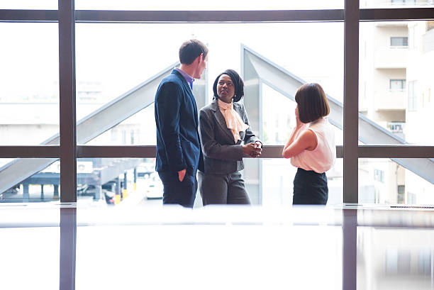 istock Business networking in an office foyer 540831122