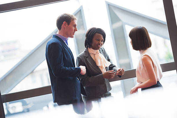 istock Business networking in an office foyer 540831222