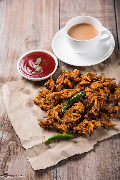 istock onion bhaji or pakora served with tomato ketchup and tea 540831424