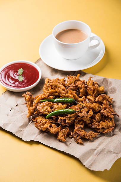 istock onion bhaji or pakora served with tomato ketchup and tea 540832114
