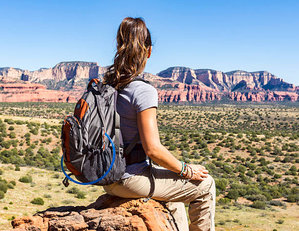 istock Woman Outdoors Takes a Break From Hiking 540832384