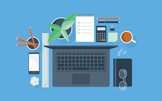 A flat vector illustration of a neatly organized workspace. May be used for a variety of applications, including backgrounds, web banners and graphics, presentations, posters, advertising, and printed materials.