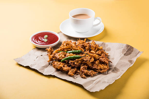 istock onion bhaji or pakora served with tomato ketchup and tea 540832808