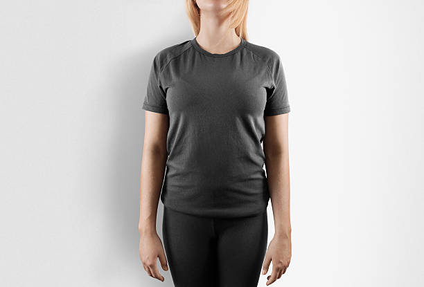 blank grey t-shirt design mockup. women stand in gray - gray shirt imagens e fotografias de stock