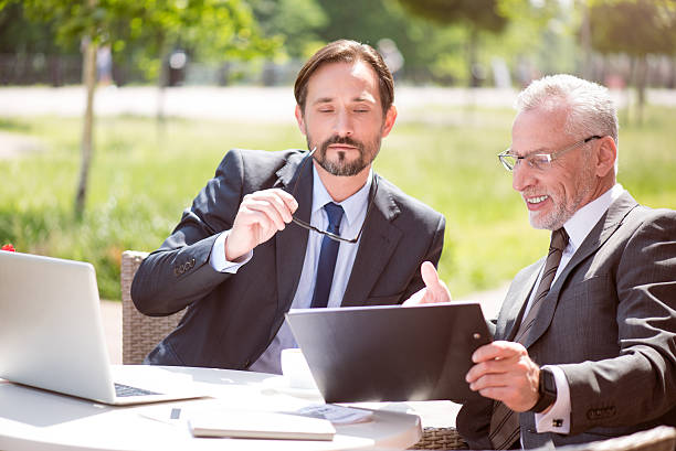 istock Pleasant colleagues sitting at the table 540833800