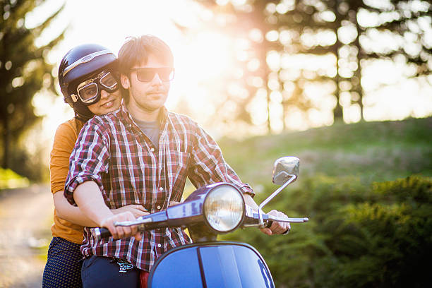 istock Cute couple riding scooter 540834486