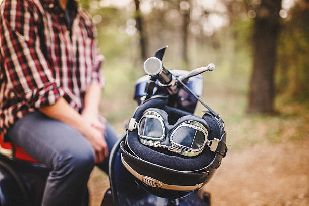 istock Retro motorcycle helmet with glasses on old scooter 540834538