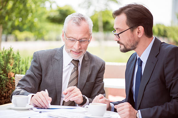 istock Involved colleagues sitting at the table 540834646
