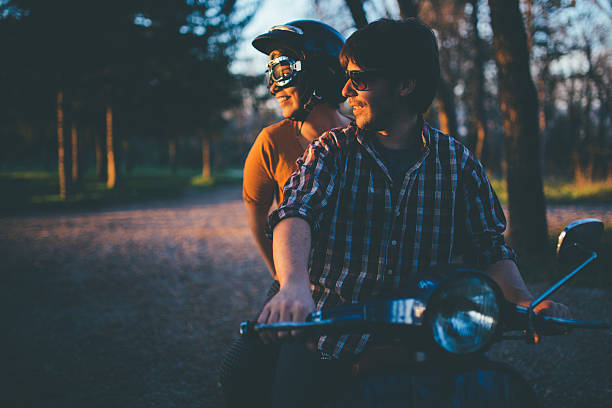 istock Vintage Couple with Scooter in Italy 540834720