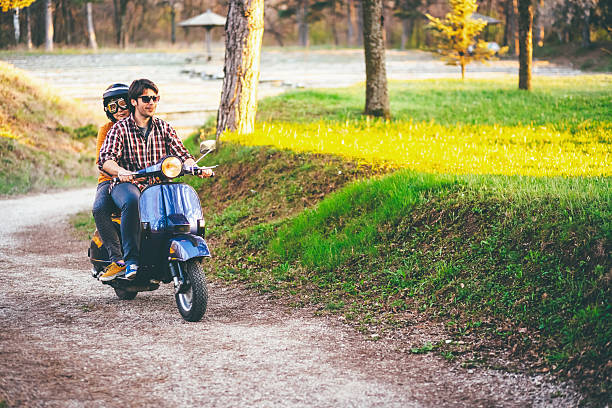 istock Cute couple riding scooter 540835002