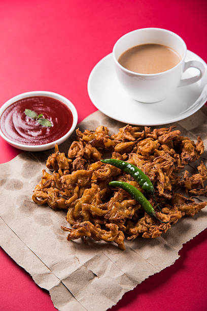 istock onion bhaji or pakora served with tomato ketchup and tea 540835026