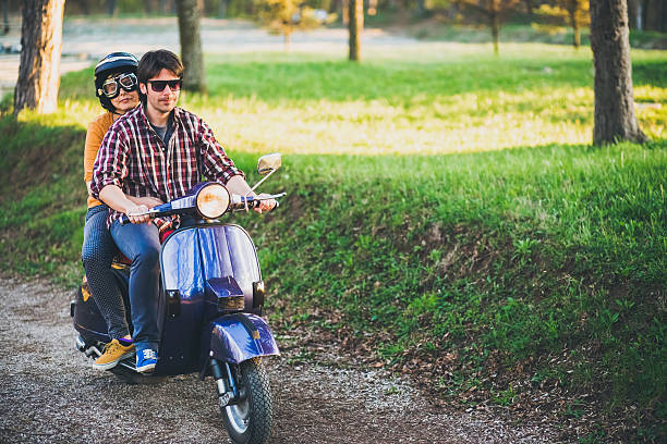 istock Cute couple riding scooter 540835482