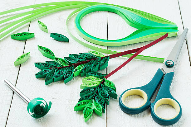 Making rowan leaves in the technique of quilling stock photo