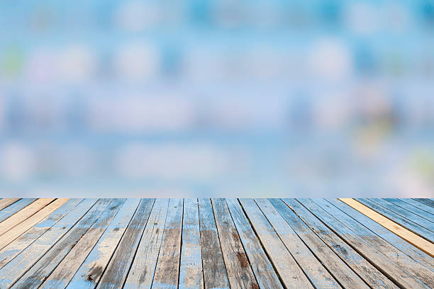 istock Wood floor on abstract blur background with blurry bokeh defocus 540837096