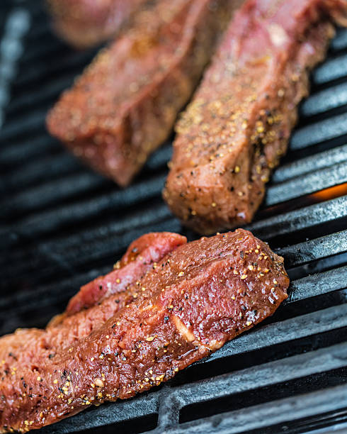istock Raw sirloin steaks on the bbq 540837300
