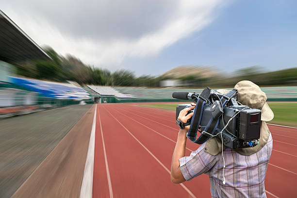 istock Video cameraman operator with motion blur sport stadium 540837562