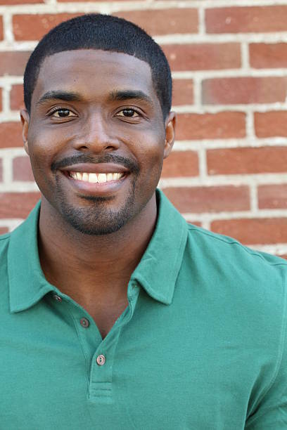 istock Young handsome African business man laughing 540838196