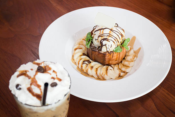 istock Honey toast with banana and ice coffee 540839456