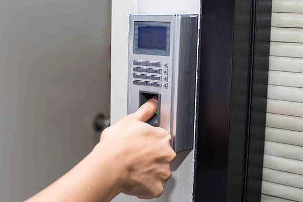 istock fingerprint and password lock in a office building 540839648