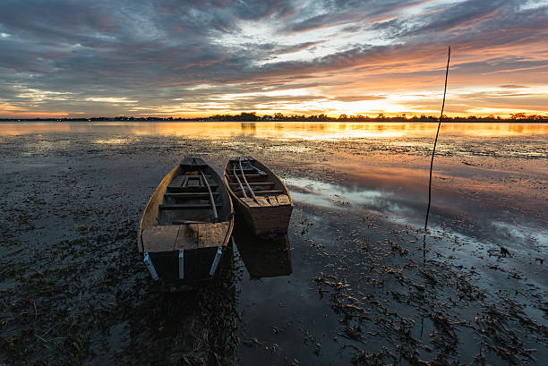 istock Small fishing boat in sunset. 540841776